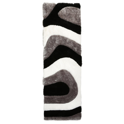 Tapis à poils longs Mateos au design abstrait